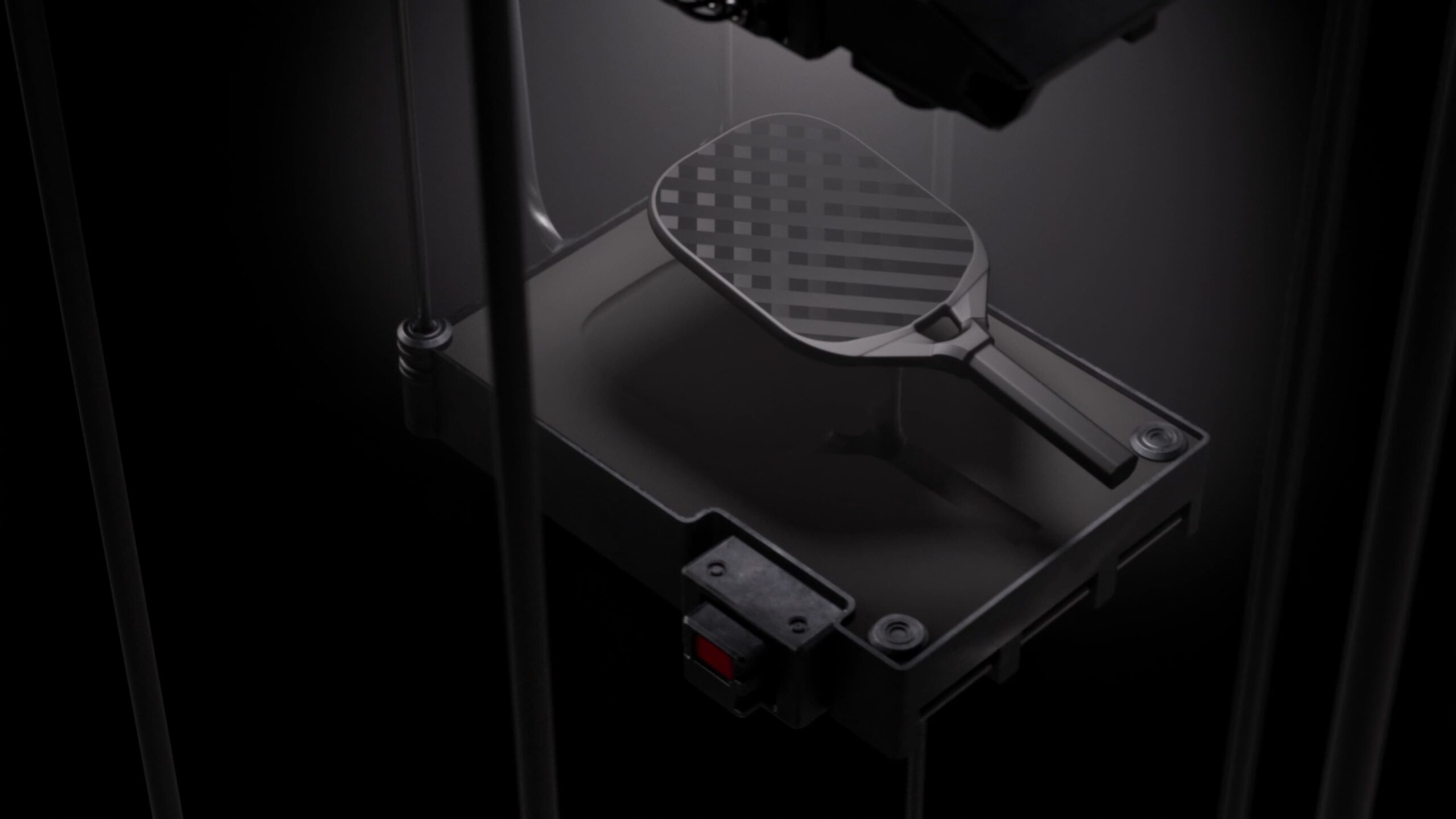 PickleBall Metalbone 3.2 — A black and white photo of a tennis racket.